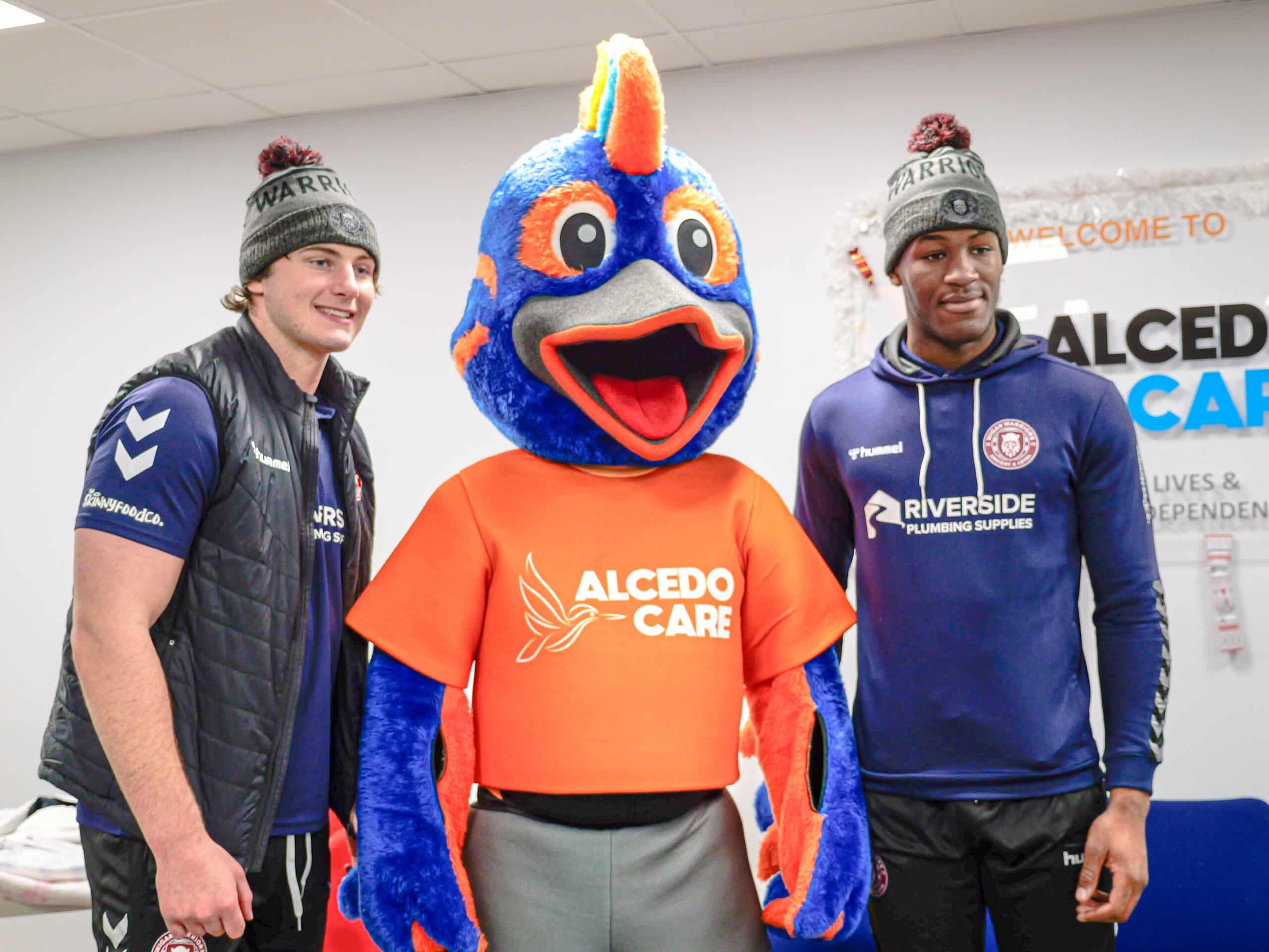 Wigan Warriors Ethan Havard, Al (Alcedo Care Mascot), Junior Nsemba Wigan Warriors Ethan Havard, Al (Alcedo Care Mascot), Junior Nsemba
