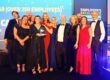 Alcedo Care accepting their Large Employer of the Year award at Employer's Excellence Awards 2025 with Vernon Kay
