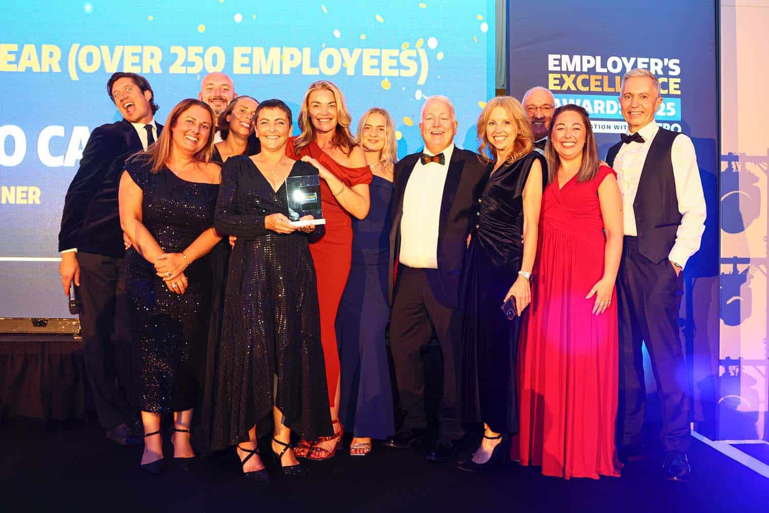 Alcedo Care Honoured with Employer’s Excellence Award Alcedo Care accepting their Large Employer of the Year award at Employer's Excellence Awards 2025 with Vernon Kay